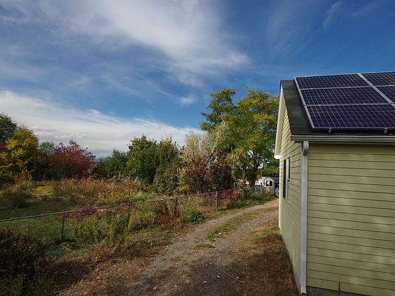 Bedroom overlooks half-acre yard