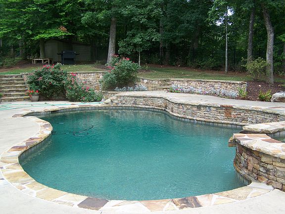 Heated Pool & terraced backyard