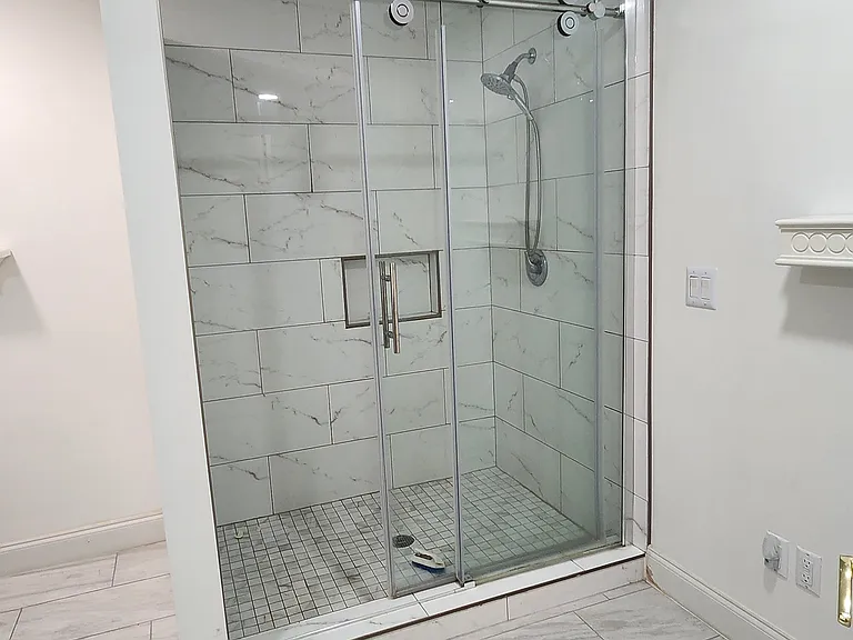 Master bathroom with frameless shower