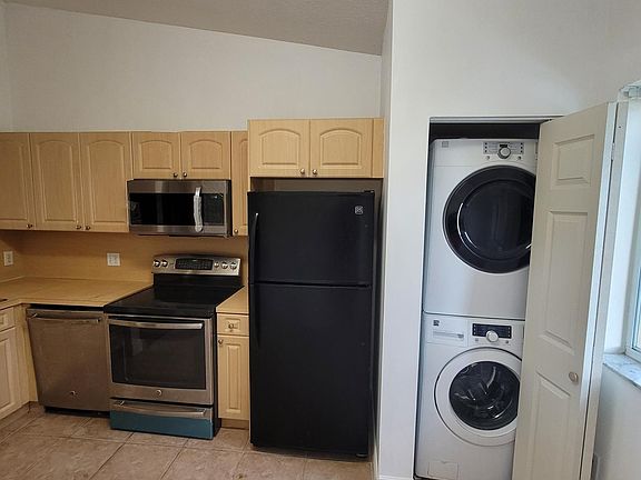 Kitchen. Washer and dryer inside unit.