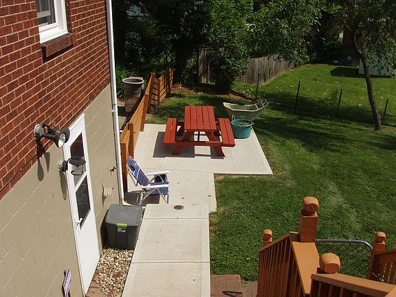 On deck facing yard/slab