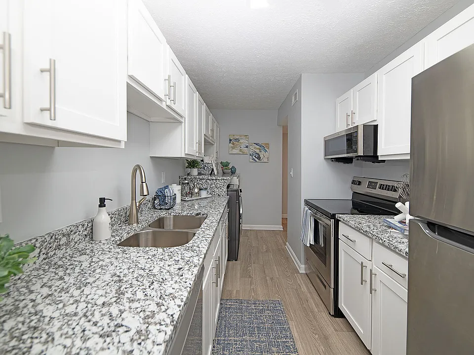 Kitchen with granite counters and stainless appliances