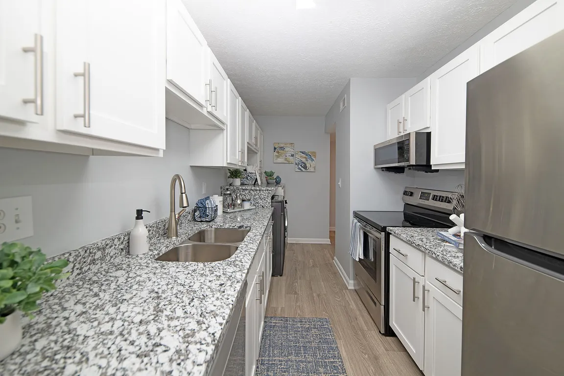 Kitchen with granite counters and stainless appliances
