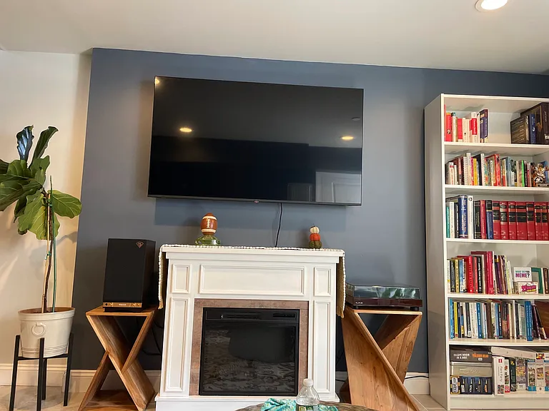 Basement living room. Also has an office and gym and 1/2 bath.