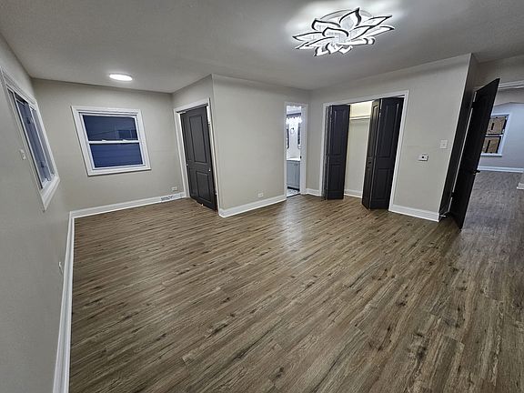 A royalty-type master suite with 2 closets, and your own bathroom with two sinks. There is room for a home office in the suite, too!