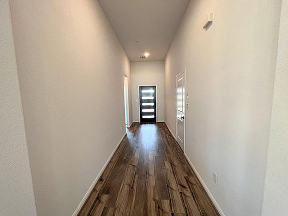 High ceilings, luxury Vynl plank flooring