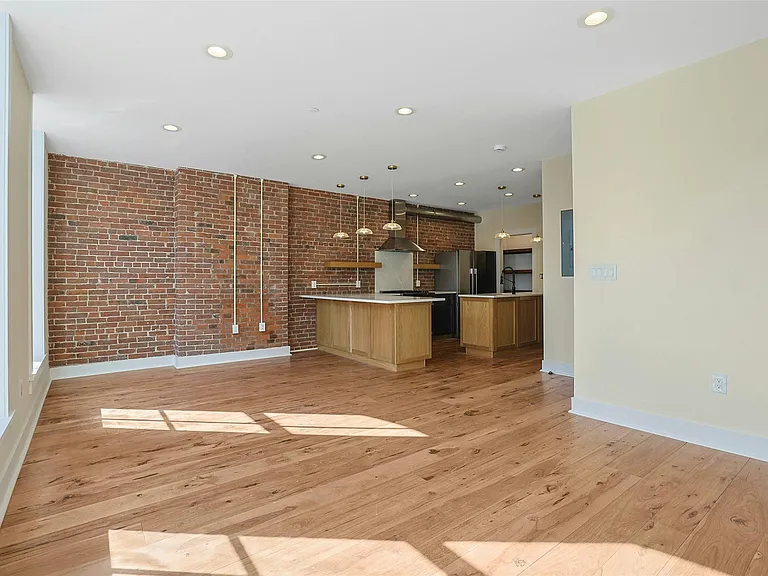 Living Room: Light bathes your living areas, dining and kitchen areas.