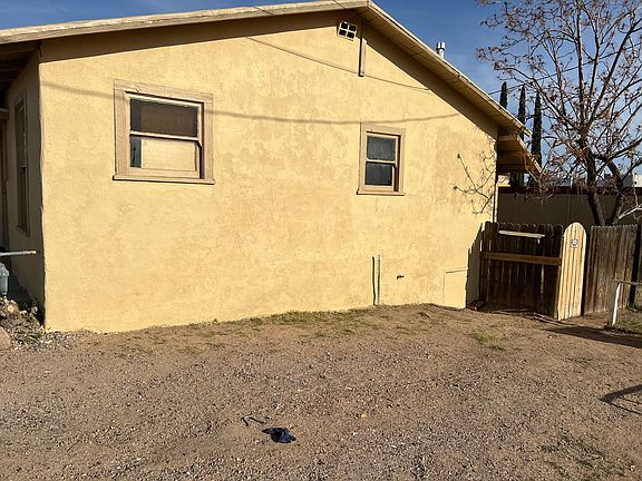 Side of House and small front yard or parking