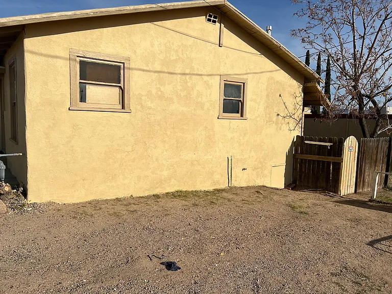 Side of House and small front yard or parking