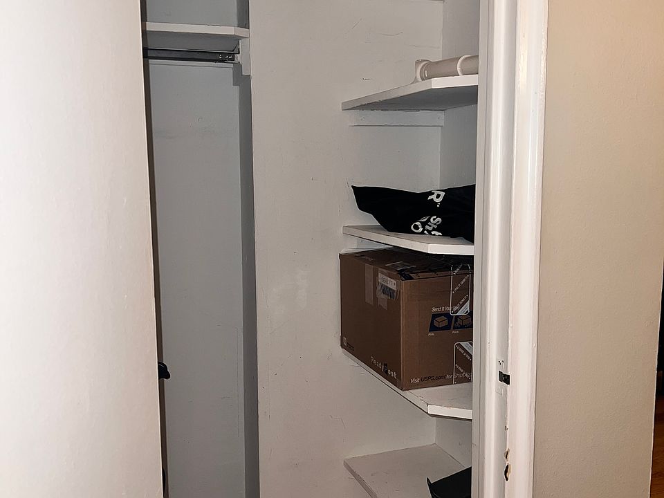 Coat closet with extra shelving