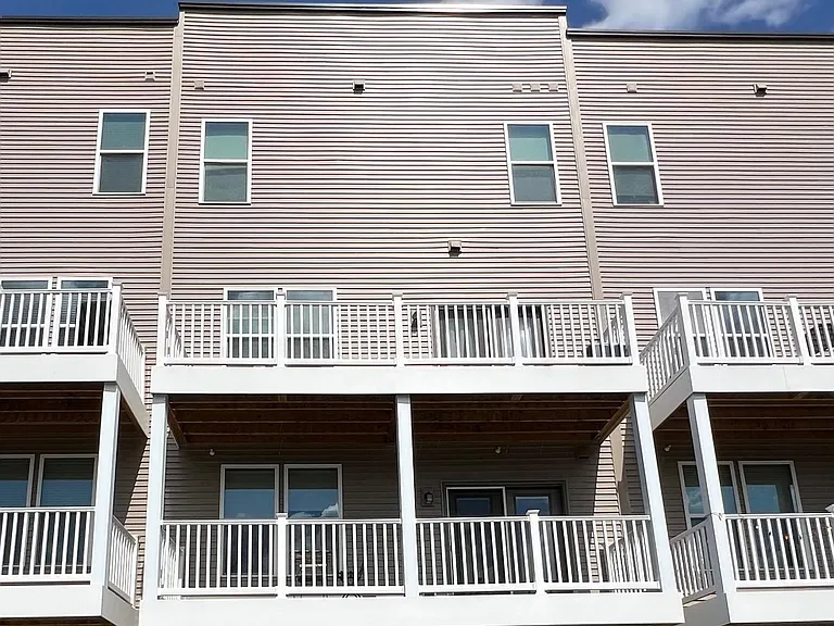 Top patio is the units patio, bottom left garage is the units garage and driveway.