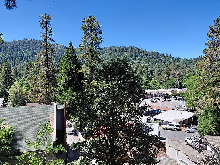 Peaceful mountain and downtown Crestline views.