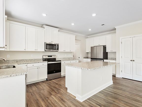 Chef-ready kitchen with stainless steel appliances and granite countertops