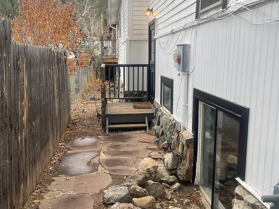 Entrance and fenced in side yard