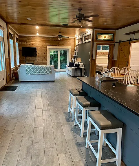 Photo as you enter from foyer/mud room to the open floor plan with kitchen on your right