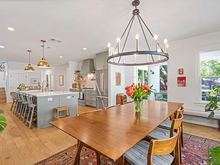 dining area and kitchen as well as stairs to the second floor
