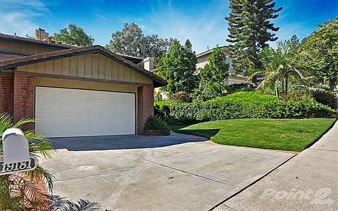 Driveway leading to the 2-car garage