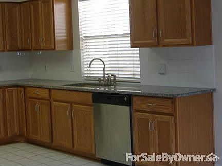 granite counter tops, new sink & Kitchen Aid garbage disposal