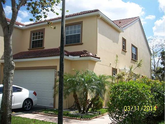 2nd image of 9810 Royal Palm Blvd #63-11