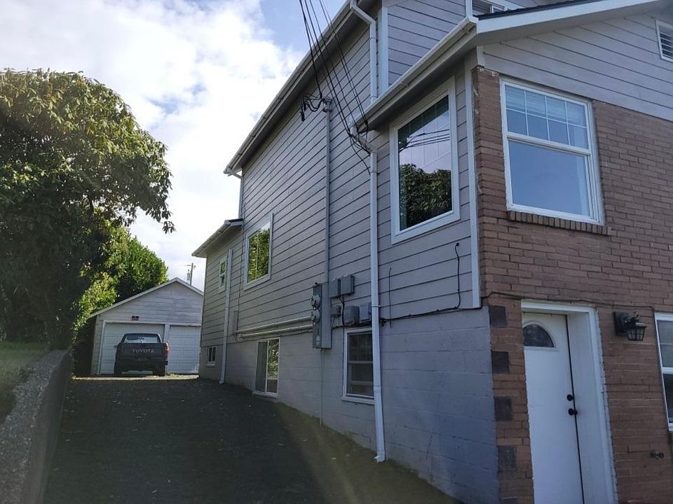 Driveway to parking and yard in the back of home. Double car garage available to rent for a separate fee of $80 per month.