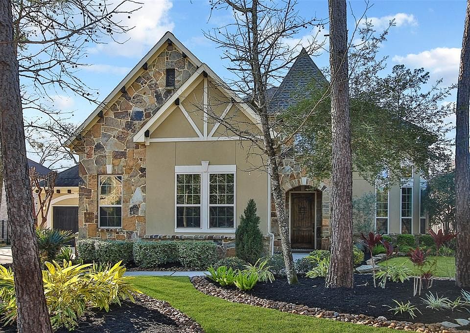This home has been well-maintained, with attention to landscaping and new mulch.