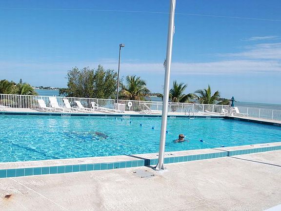 Enjoy swimming in the above ground pool overlooking ocean
