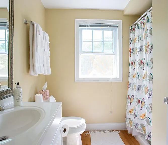 Main floor bathroom with shower.