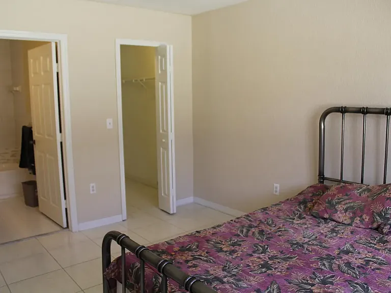 The master bedroom has a bathroom and walk-in closet.