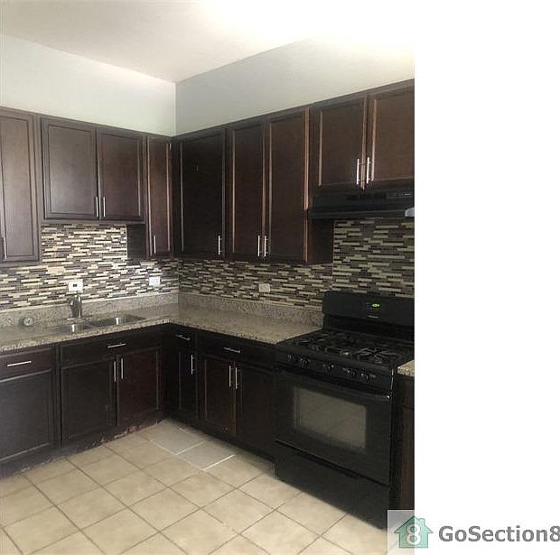1st image of 7044 S Woodlawn Ave #1