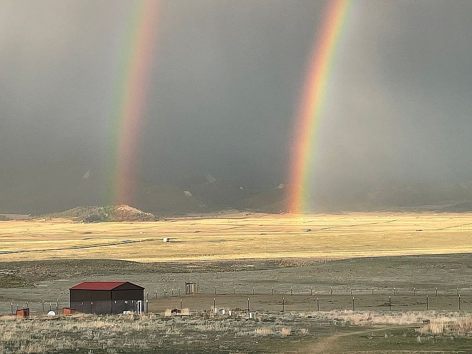 Horse barn in pasture