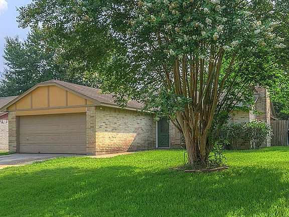 This home has wonderful mature trees in the landscaping