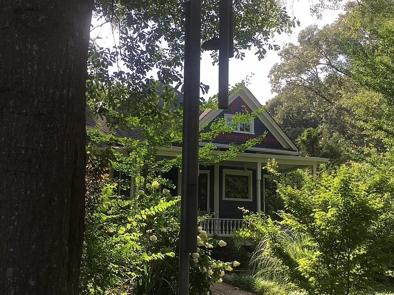 View from the street of the handmade tornado chime (they are way too heavy to work as a proper wind chime).