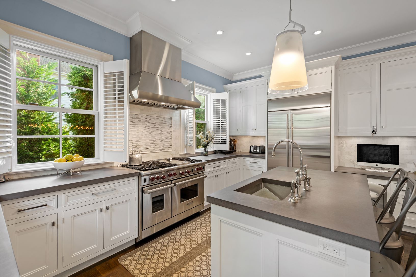  Stainless steel appliances and stone counters