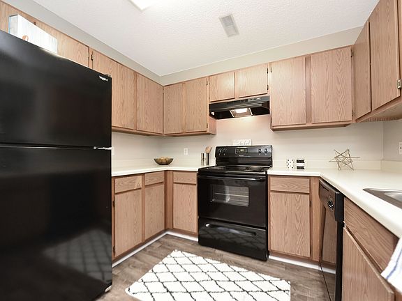 Experience the elegance of a modern kitchen with sleek finishes and functional design.