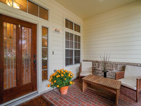 Covered front porch welcomes your family and friends