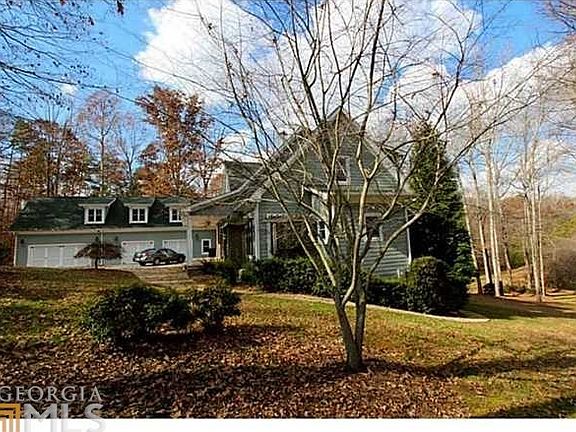 Fabulous cottage is much larger than it appears from the front.