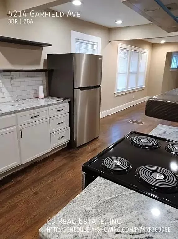Charming 2-Bed Single Family Home with Central Air and In-Unit Laundry — Photo 4