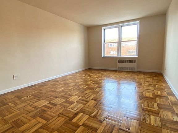 4th image of 31-15 68th St #1H