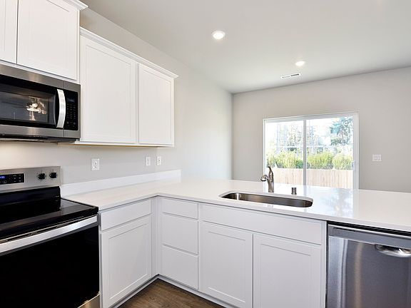 Each kitchen comes with stainless-steel appliances included.