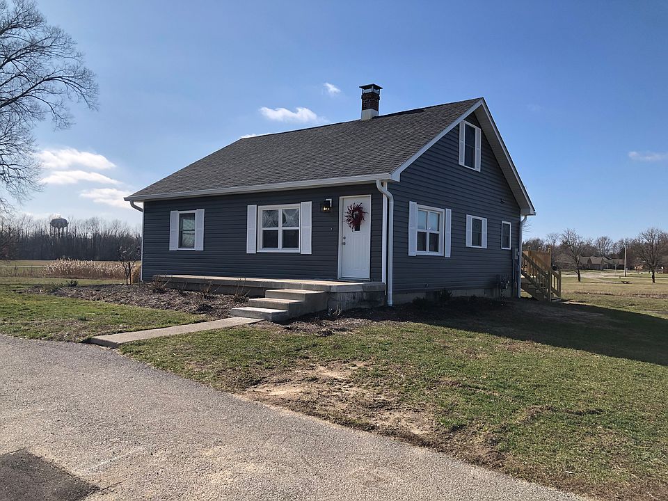 New vinyl siding and gutters