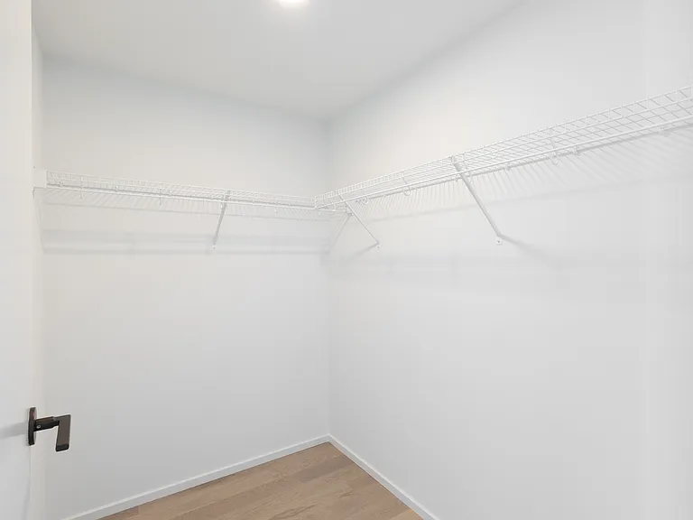 primary bedroom walk in closet