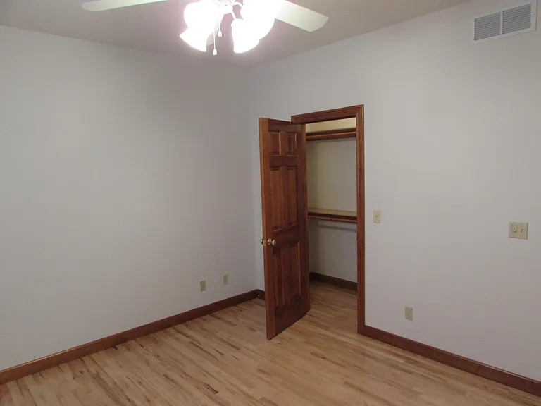 East main floor bedroom walk-in closet