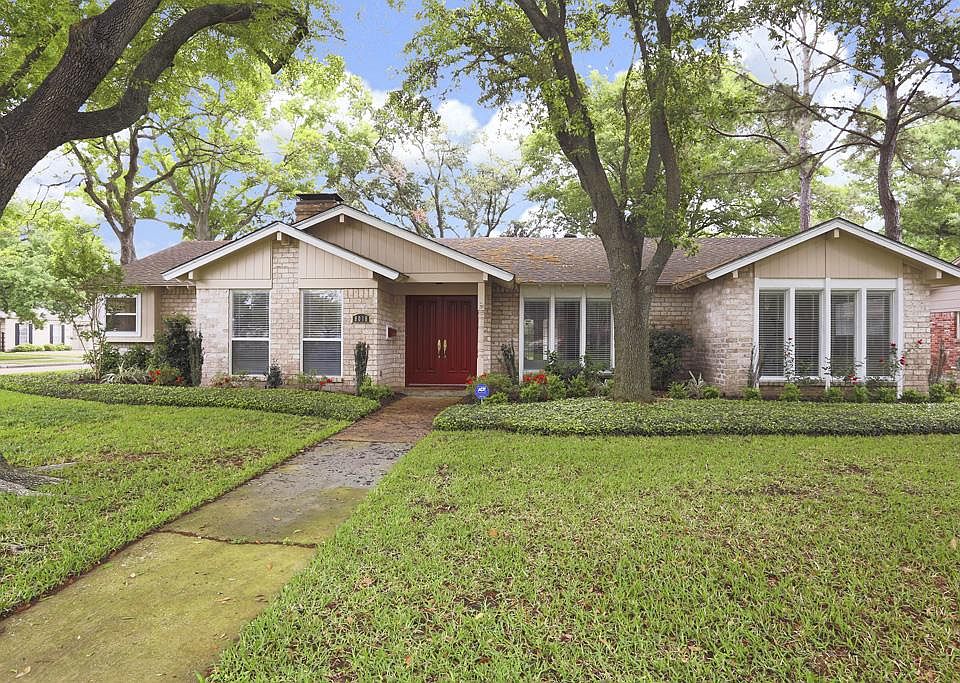Beautifully update 4/2.5 with beautiful, mature trees on a large neighborhood lot.