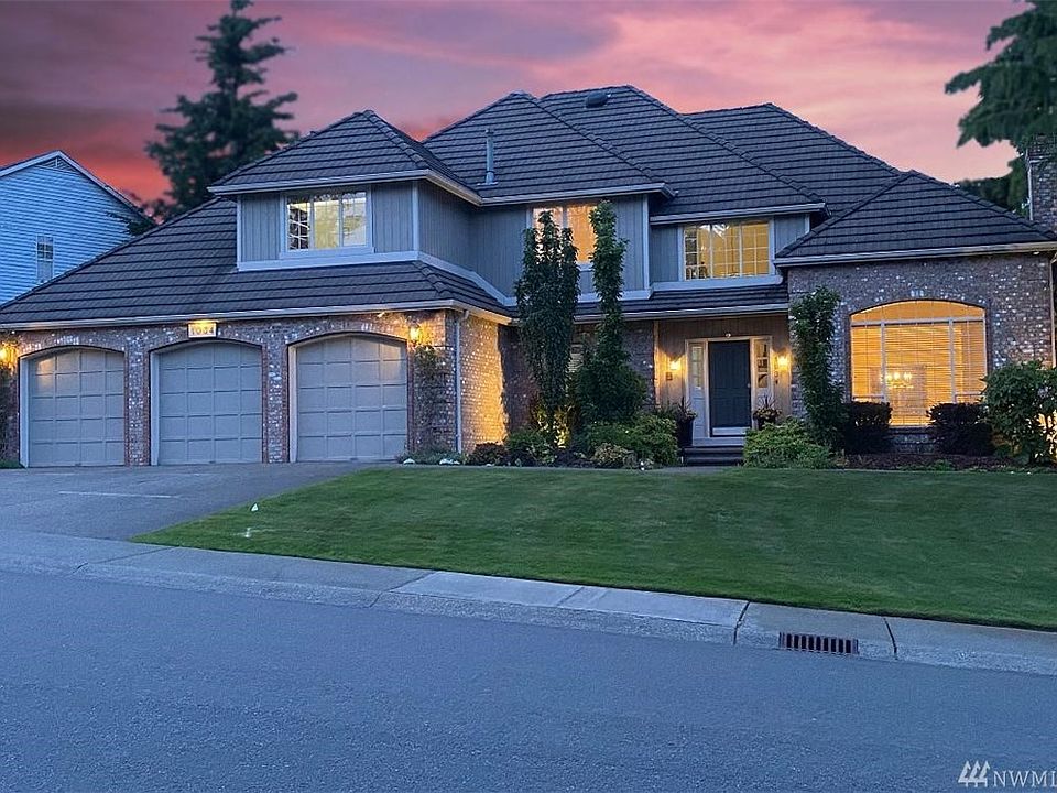 With a 3 car garage, a tile roof and landscape lighting, this home is a stunner!
