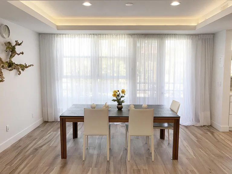 Spacious Formal Dining can accommodate 10 guests comfortably on rectangular table