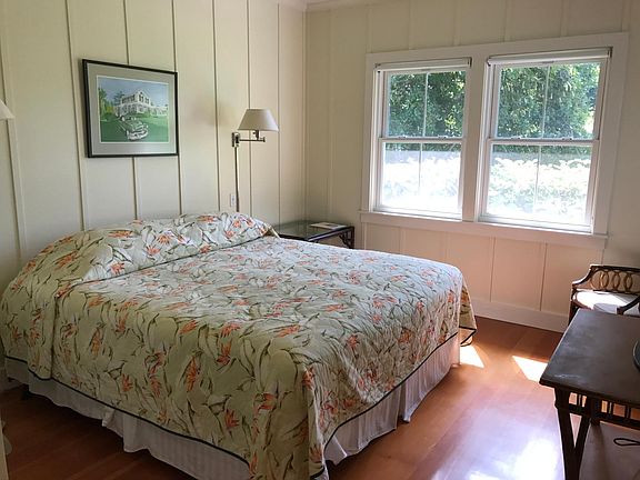 Master bedroom with king bed and lots of natural light