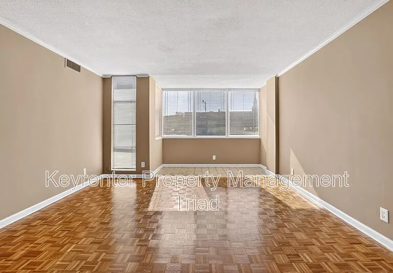 1101 N Elm St #104 — Photo 13