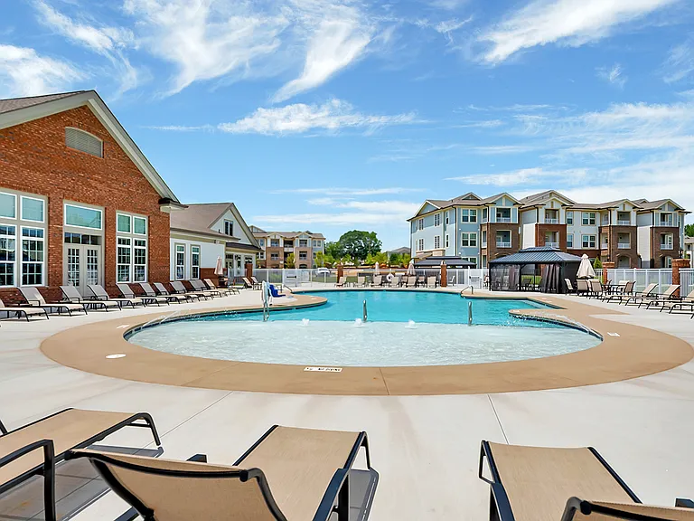 Enjoy premier amenities like a resort style pool with multiple cabanas and lounge chairs
