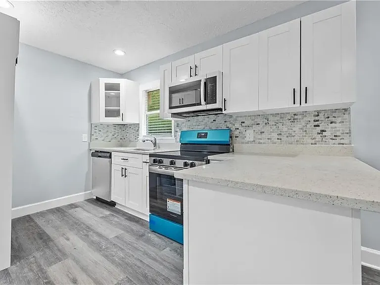 View of the kitchen and appliances.
