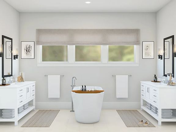 Primary bath with dual vanities and freestanding tub